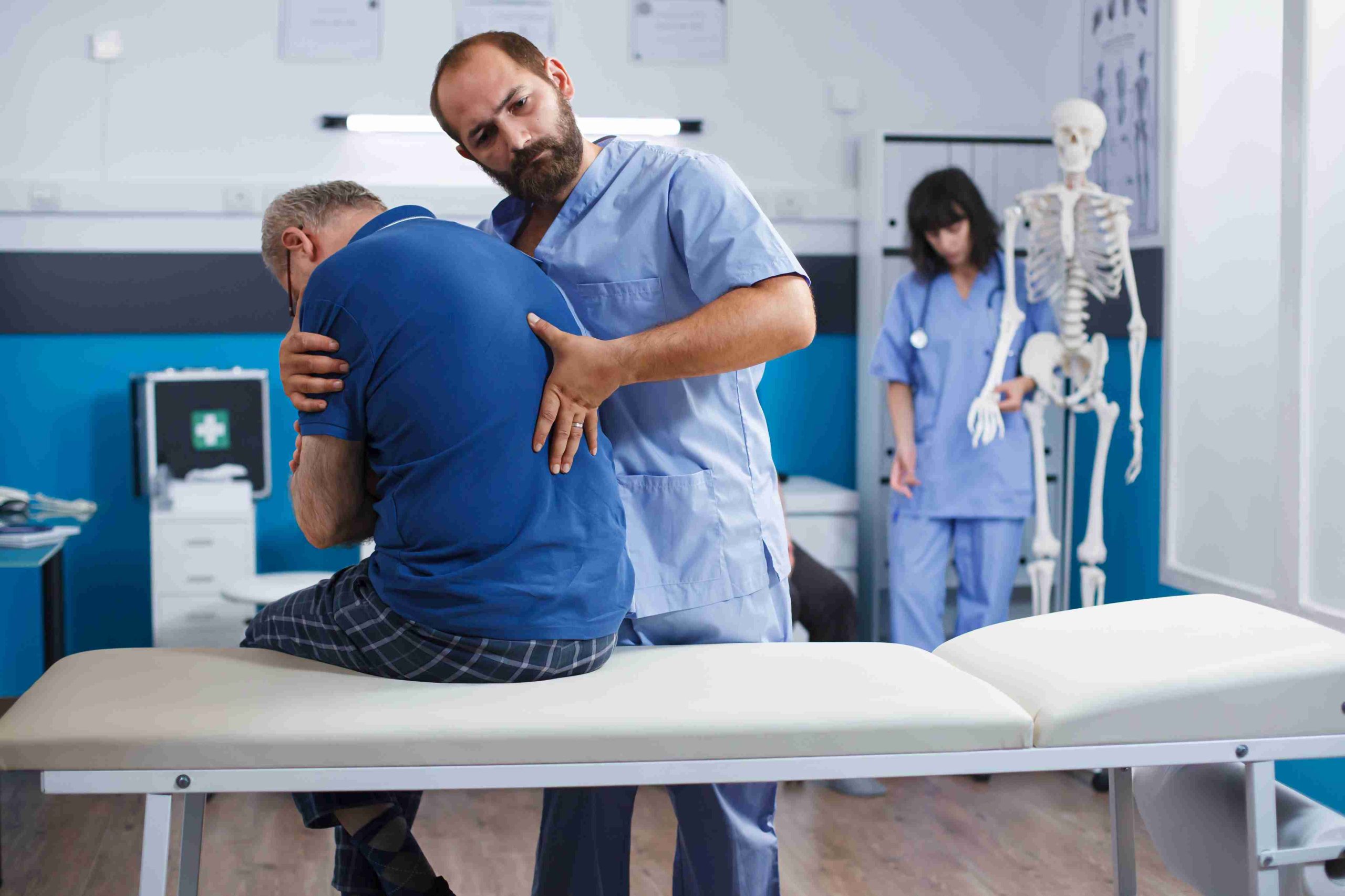 Licensed chiropractor performing precise spinal alignment adjustment