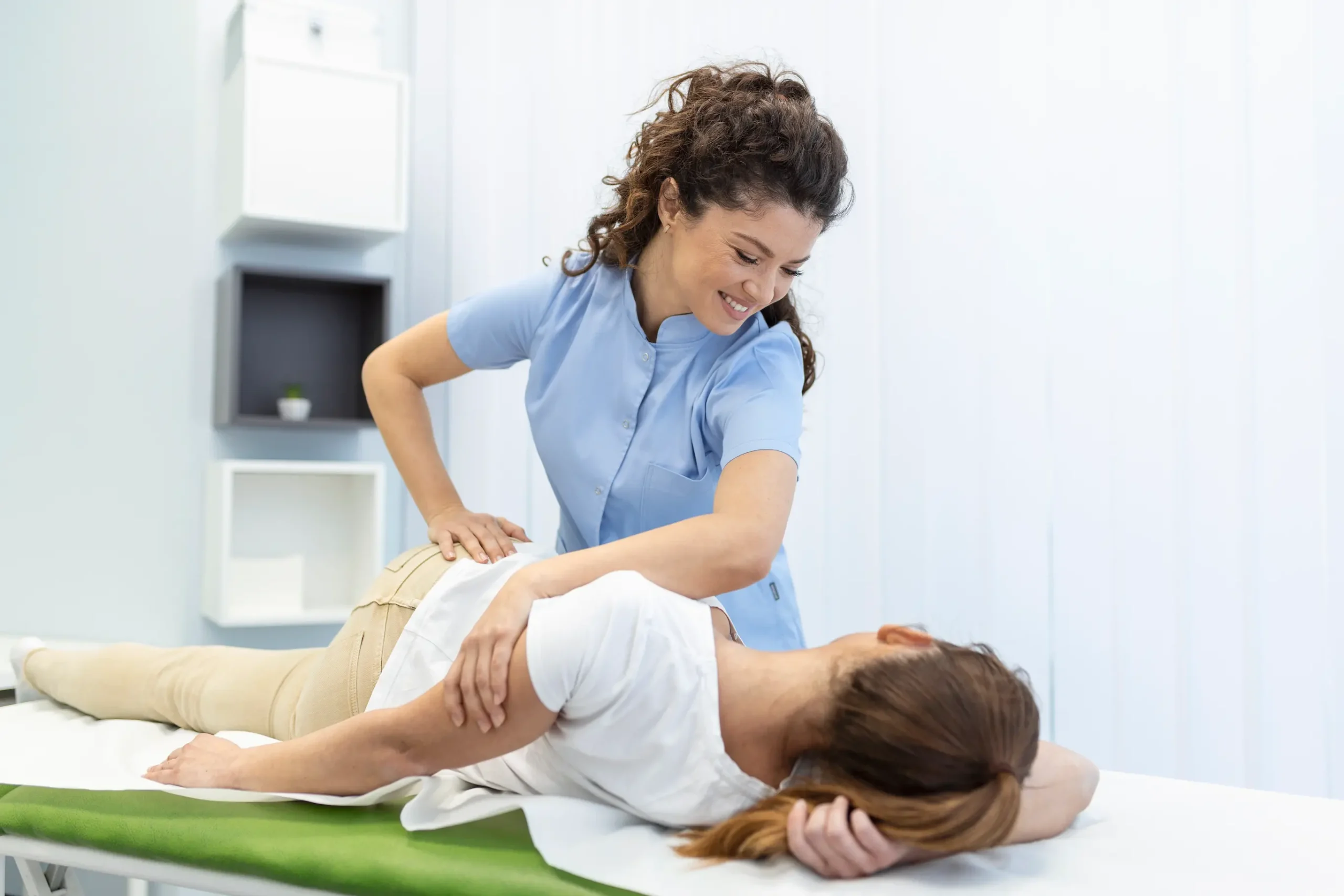 Chiropractor performing spinal alignment and joint mobilization therapy at Enspire clinic